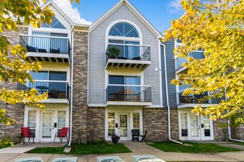 Apartment building with balconies and doors